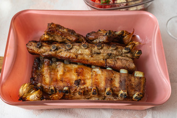 Home grilled pork ribs with garlic