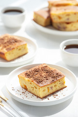 Slice of fruit pie on a white plate..