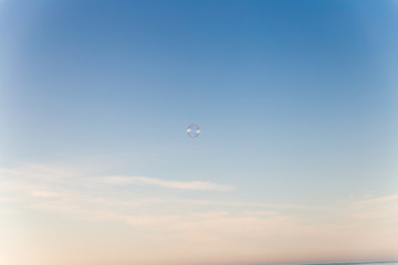soap bubble in the blue sky