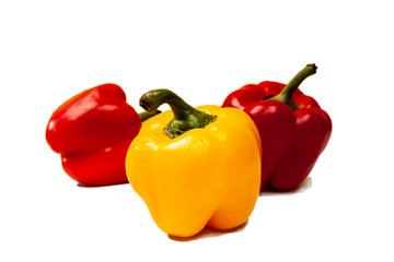 Composition of isolated fresh harvest Bulgarian pepper on a wtite backround