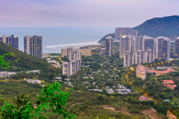 Obraz premium Evening view of Banshan Peninsula (Banshan Bandao), Xiao Donghai Beach from Luhuitou Mountain Park, Sanya, Hainan, China