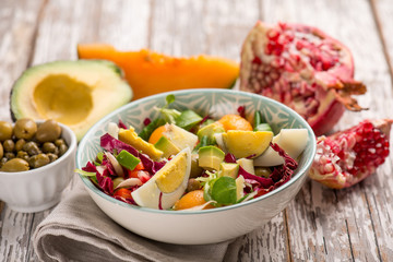 mixed avocado salad with pomegranate melon radish and salad