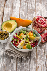 mixed avocado salad with pomegranate melon radish and salad