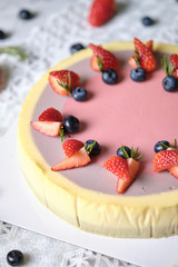 Low Fat Mousse Yogurt Strawberry and Raspberry Cheesecake set on cafe table.  Gluten Free Low-Carb Healthy Dessert.