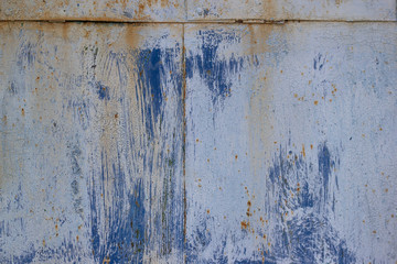 The texture of iron shields painted blue white faded