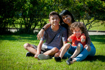 Fototapeta premium happy family having fun in the park