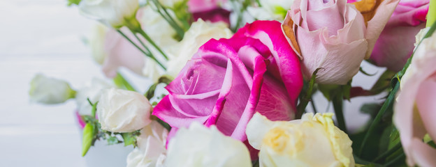 Beautiful bouquet of flowers on white background. Roses, eustoma and tulips. Stylish present for all holidays. Happy birthday gift. Mother's day postcard. Spring mood.