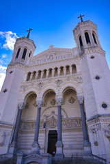 Obraz premium The Basilica of Notre Dame de Fourviere overlooking Lyon, France.