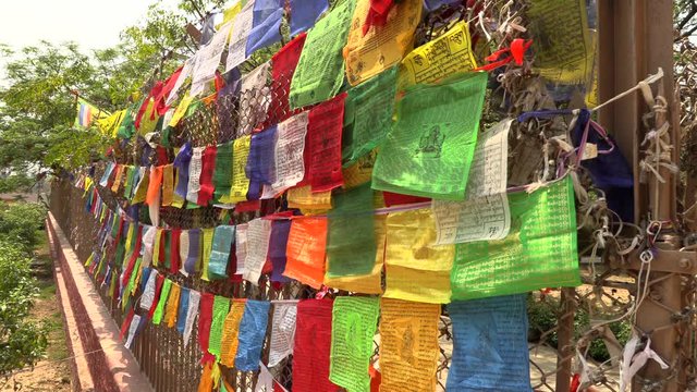 Tibetan prayer flags hanging in Sarnath, Varanasi, India, 4k footage video