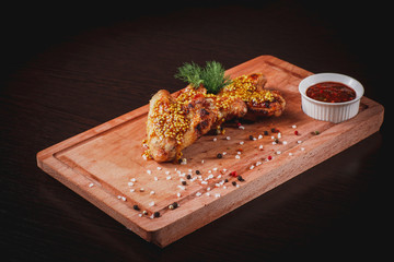 grilled chicken wings on a Board