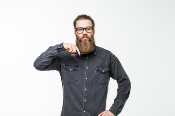 Barber scissors, barber shop. Brutal man, moustache male in barbershop, haircut, shaving. Mans haircut in barber shop. Profile of stylish beard man, scissors. Bearded man isolated on white background.