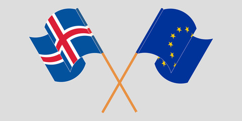 Crossed and waving flags of Iceland and the EU