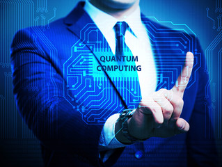 Businessman pressing virtual button in quantum computing concept