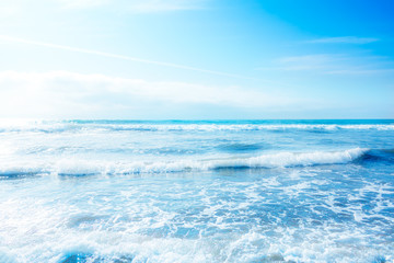 Wide blue ocean waves at day