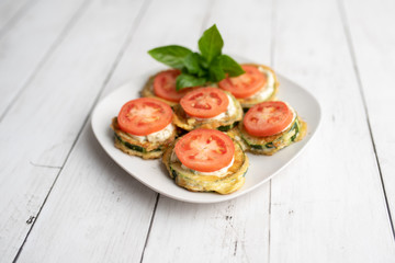 Fried zucchini with tomato dill mayonnaise and garlic sauce. Russian, European appetizer 