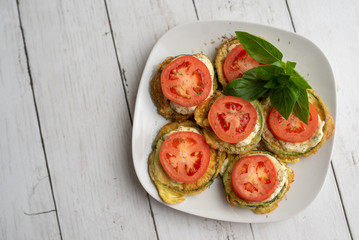 Fried zucchini with tomato dill mayonnaise and garlic sauce. Russian, European appetizer 