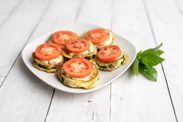 Fried zucchini with tomato dill mayonnaise and garlic sauce. Russian, European appetizer 