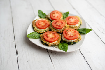 Fried zucchini with tomato dill mayonnaise and garlic sauce. Russian, European appetizer 