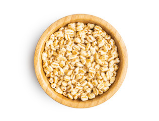 Puffed wheat covered with honey in bowl.