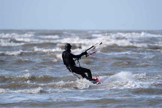 Heading out to sea on a kite board