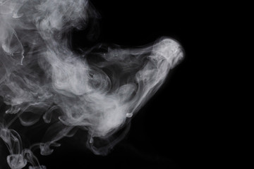 White steam on a black background.