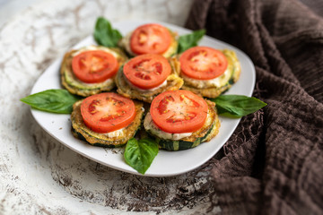 Fried zucchini with tomato dill mayonnaise and garlic sauce. Russian, European appetizer 