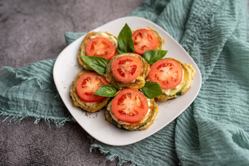 Fried zucchini with tomato dill mayonnaise and garlic sauce. Russian, European appetizer 