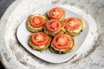 Fried zucchini with tomato dill mayonnaise and garlic sauce. Russian, European appetizer 