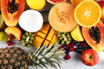 Tropical fruits background, many colorful ripe fresh tropical exotic fruits