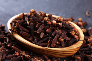 freshly dryed cloves spice texture on background