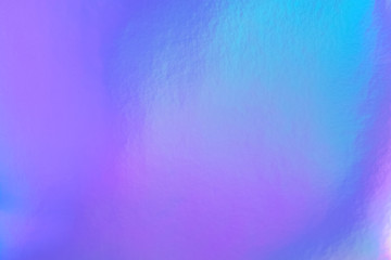 Retro holographic foil background, great design for any purposes. Abstract colorful vibrant blur iridescent gradient. Retro futuristic label design.	