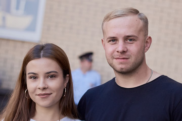portrait of a young couple of students blonde and brunette