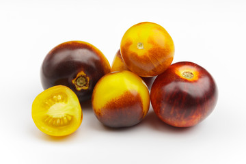 Background made from different tomatoes, white background