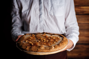 Pear galette cake with walnuts and cinnamon
