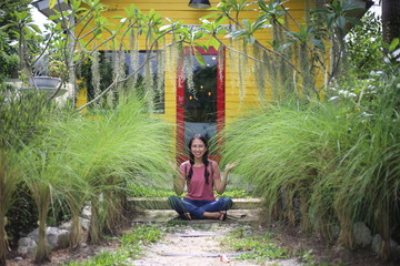 A woman resting in the garden	