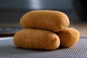 Fried sausage on the meal table. Brazilian snacks