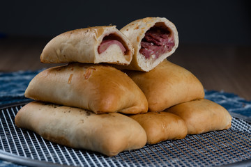 Baked and stuffed bread. Brazilian snack