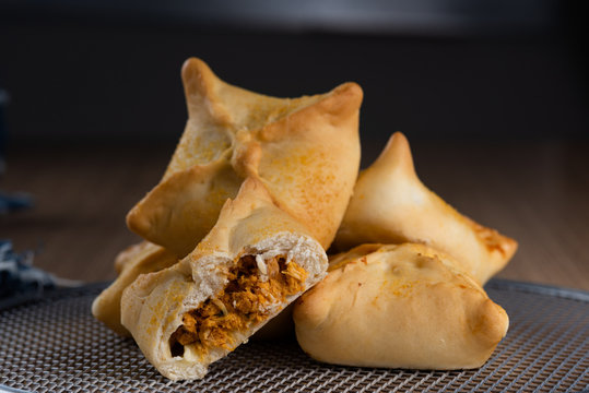 esfihas of various flavors. Brazilian snack