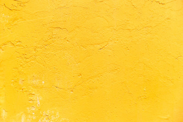 yellow colored concrete wall texture background