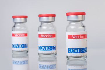 coronavirus vaccine vials isolated on white background