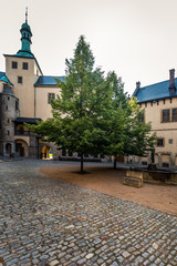 Fototapeta premium In the courtyard of the royal palace. Historic houses in the center of Kutna Hora in the Czech Republic, Europe. UNESCO World Heritage Site.