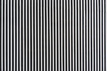 Background of a wall of smooth metal stripes