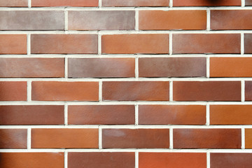 Fototapeta na wymiar Red brick wall background. Texture of ginger brickwork