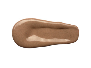 Creamy body scrub smeared on white background. Isolated