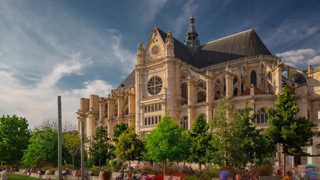 day time paris city center famous cathedral crowded park square timelapse panorama 4k france