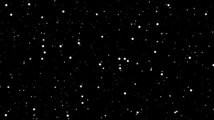 falling snow flakes isolated in black background 