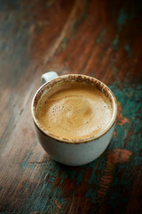  Cup of coffee on rustic wooden background. Copy space.