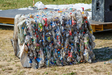 Obraz premium Ukraine Kiev MAY 10, 2019.Plastic bottles pressed and packed for recycling. recycling To conserve the environment concept.plastic bottles are collected to be melted into new plastic items.