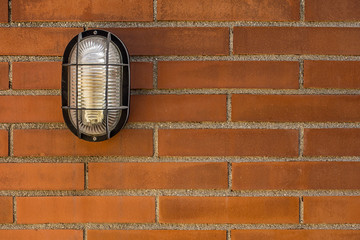 Lighting system on a brick wall.