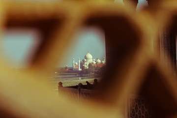 framing of taj mahal through jali from red fort in agra, uttar pradesh